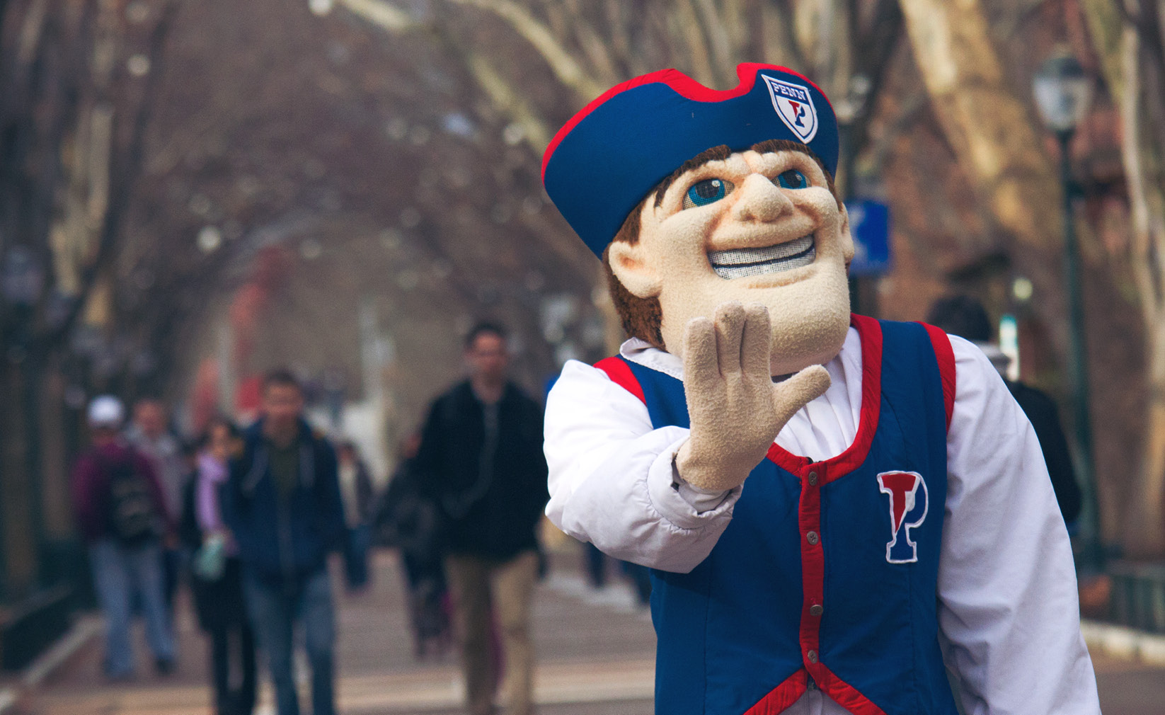 The University of Pennsylvania mascot, the Quaker, strolls through West Philadelphia.