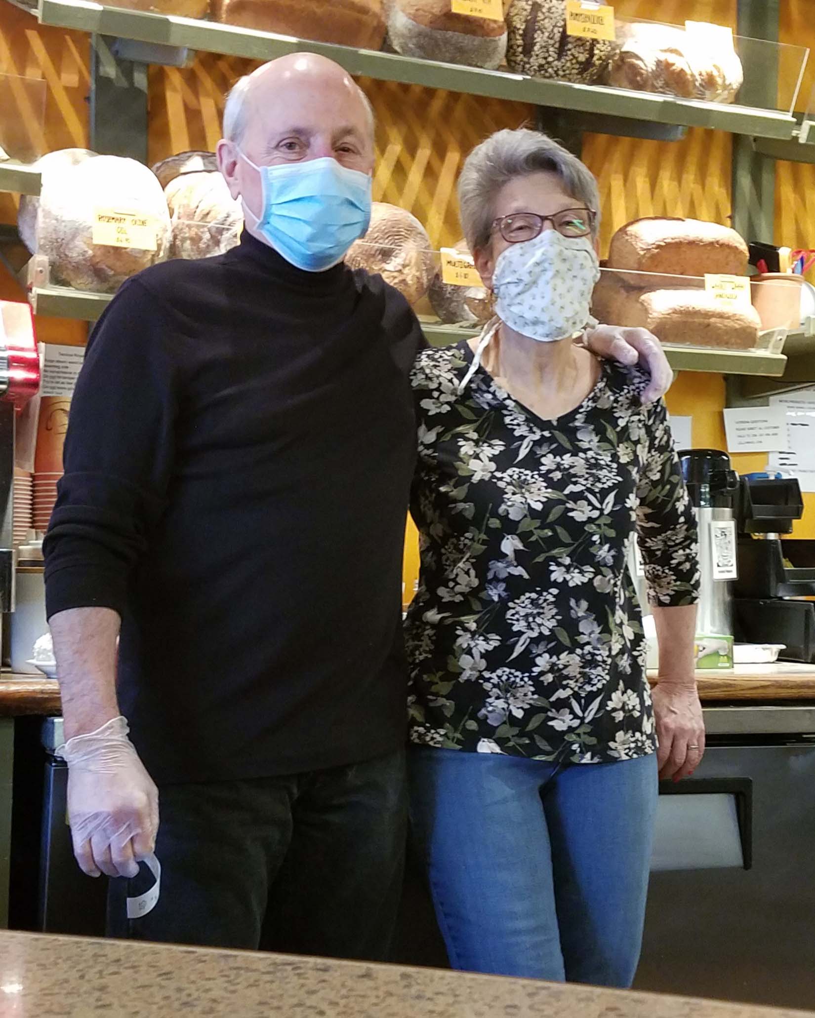 jim lilly and wife in bakery with masks