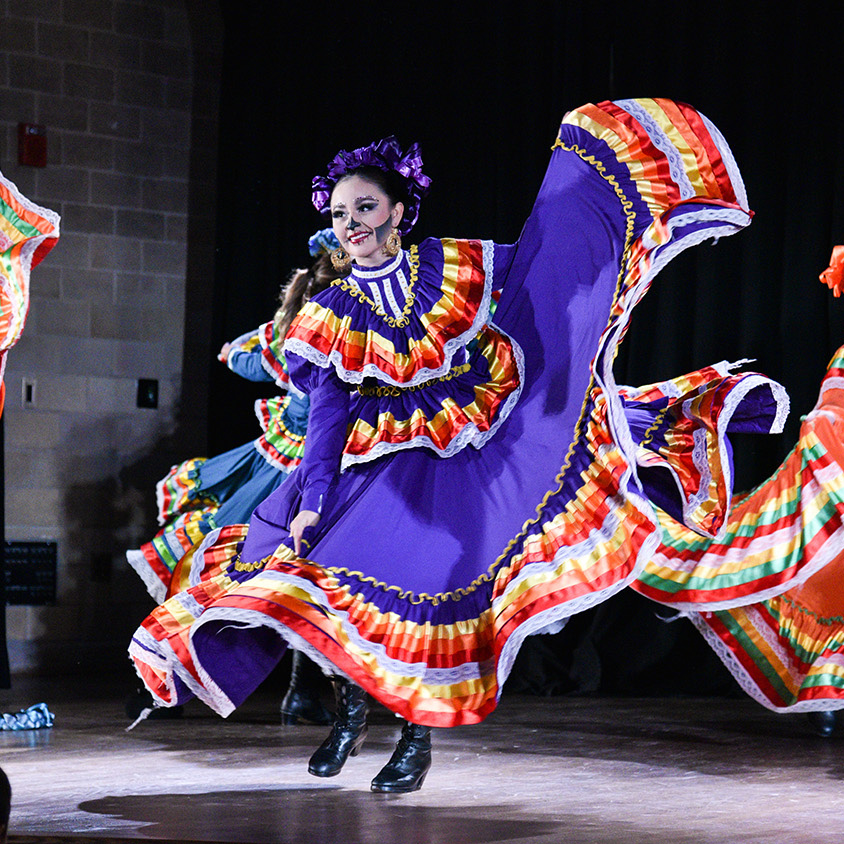 October Playlist dia de los muertos dancers performing in makeup and costumes
