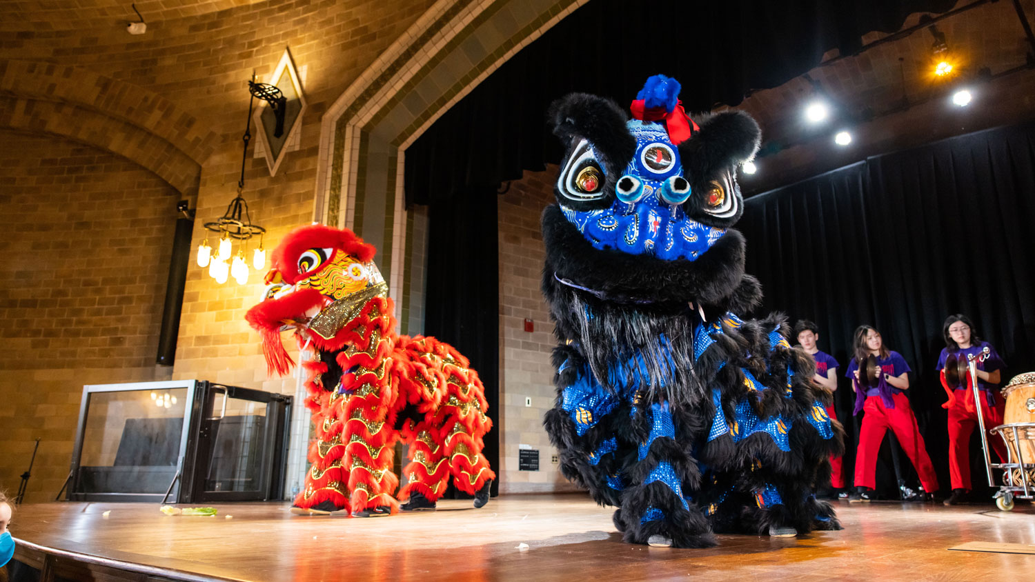 two chinese dragons on a stage