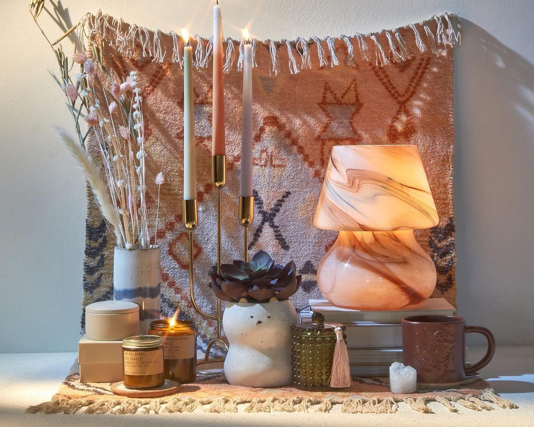clothe wall hanging with lamp in front