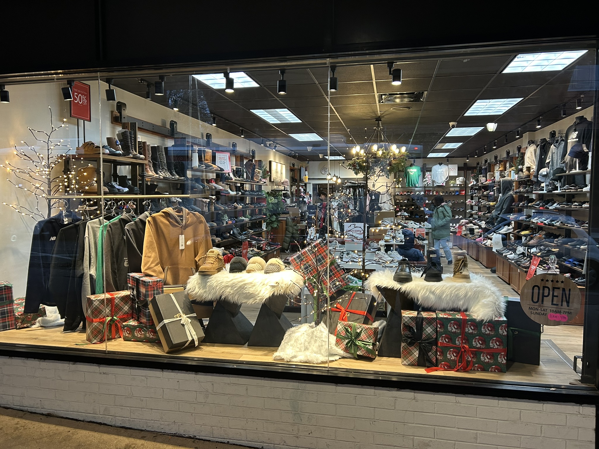 shoe store window decorated for holidays