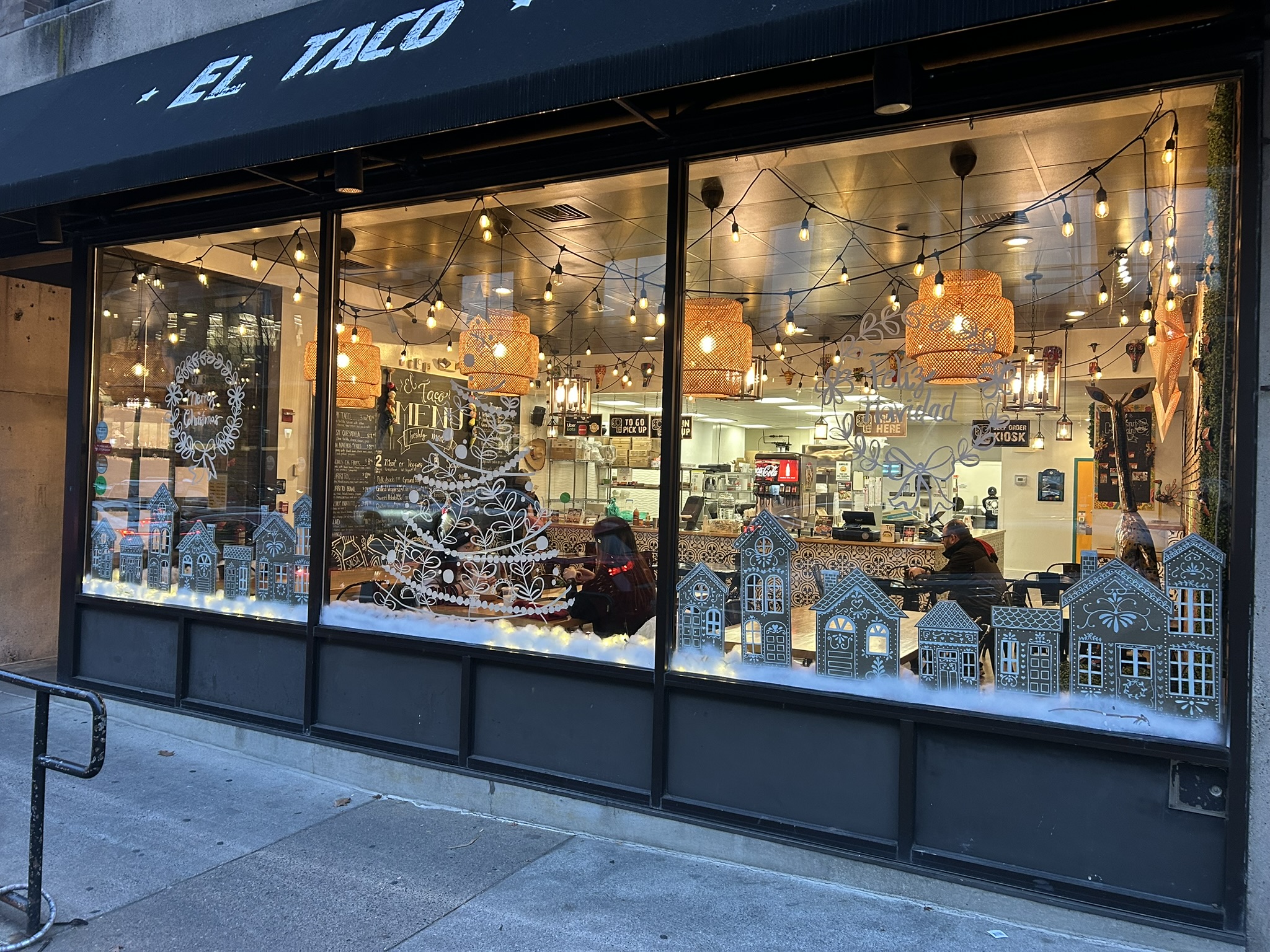 EL TACO restaurant window decorated