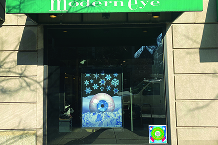 window with a winter poster featuring an eye