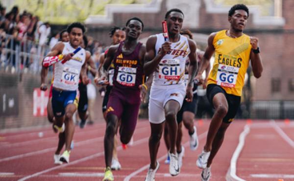 runners racing in a relay race