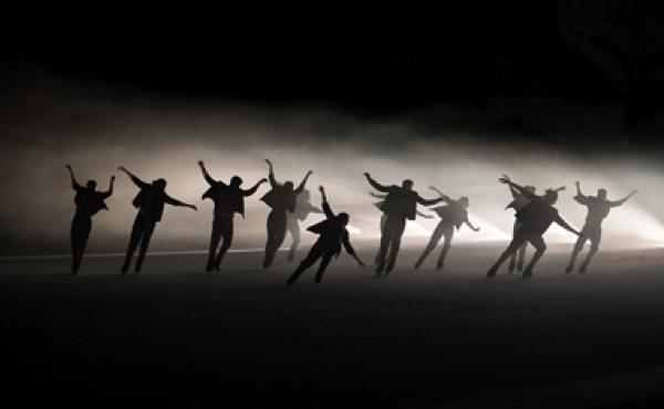 ice skaters dancing in shadows