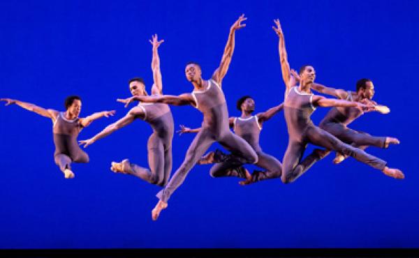 african-american ballet dancers performing in front of a blue background