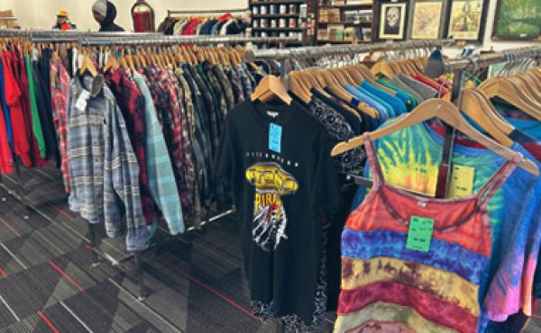 clothes hanging on racks