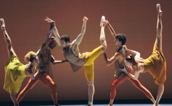 male and female ballet performers on stage