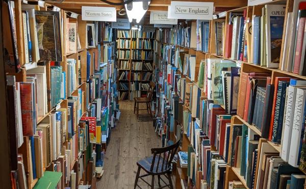 photo of crowded bookshelves in a book store 