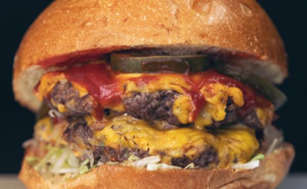 hamburger with two patties, pickles ketchup and mustard