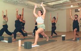 men and women doing yoga
